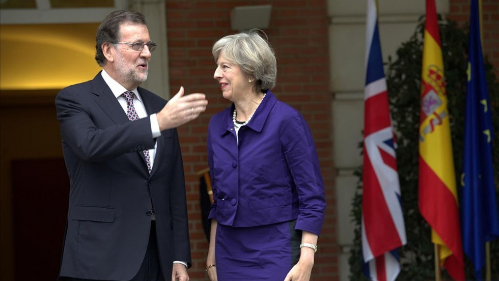 Rajoy y may